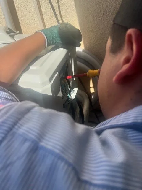 Technician working on HVAC